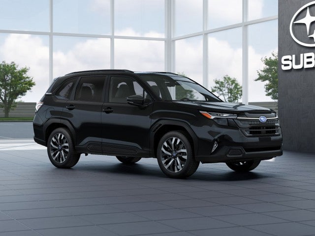 2026 Subaru FORESTER Touring in Crystal Black Silica — front three-quarter view