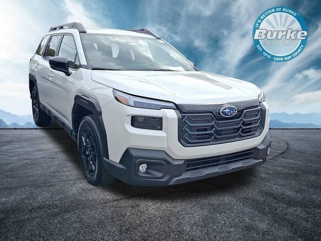 2026 Subaru OUTBACK Limited in Crystal White Pearl — front three-quarter view