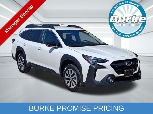 2024 Subaru Outback Premium in Crystal White Pearl — front three-quarter view