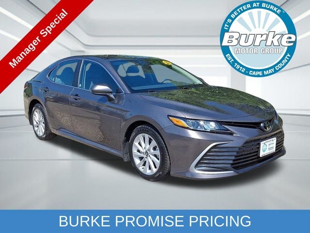 2023 Toyota Camry LE in Predawn Gray Mica — front three-quarter view
